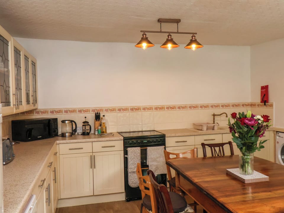 Fridge, electric kettle, toaster, cookware/dishes/utensils