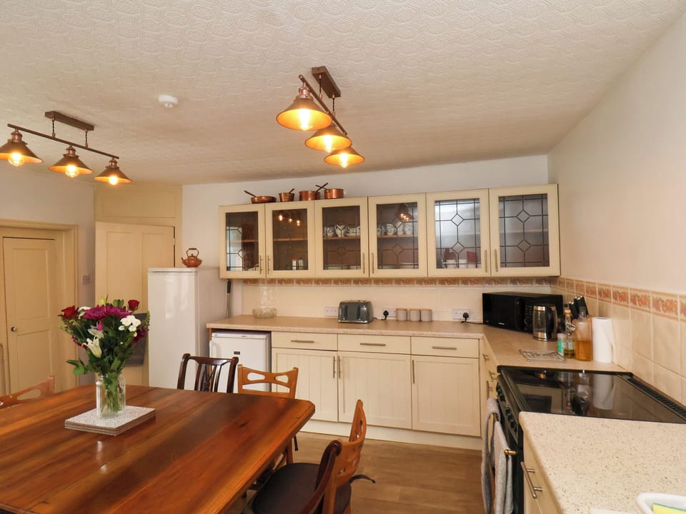 Fridge, electric kettle, toaster, cookware/dishes/utensils