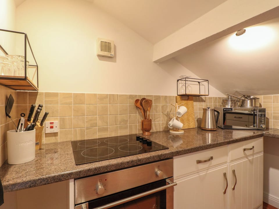Fridge, electric kettle, toaster, cookware/dishes/utensils
