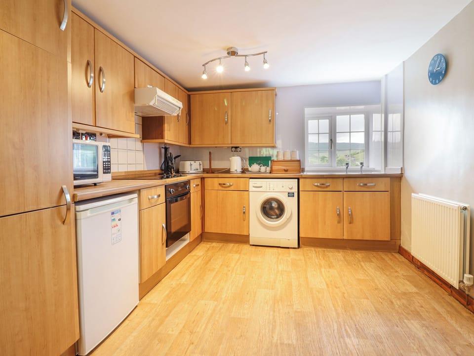 Fridge, electric kettle, toaster, cookware/dishes/utensils
