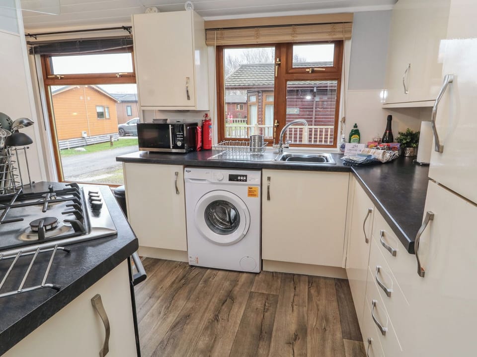 Fridge, electric kettle, toaster, cookware/dishes/utensils