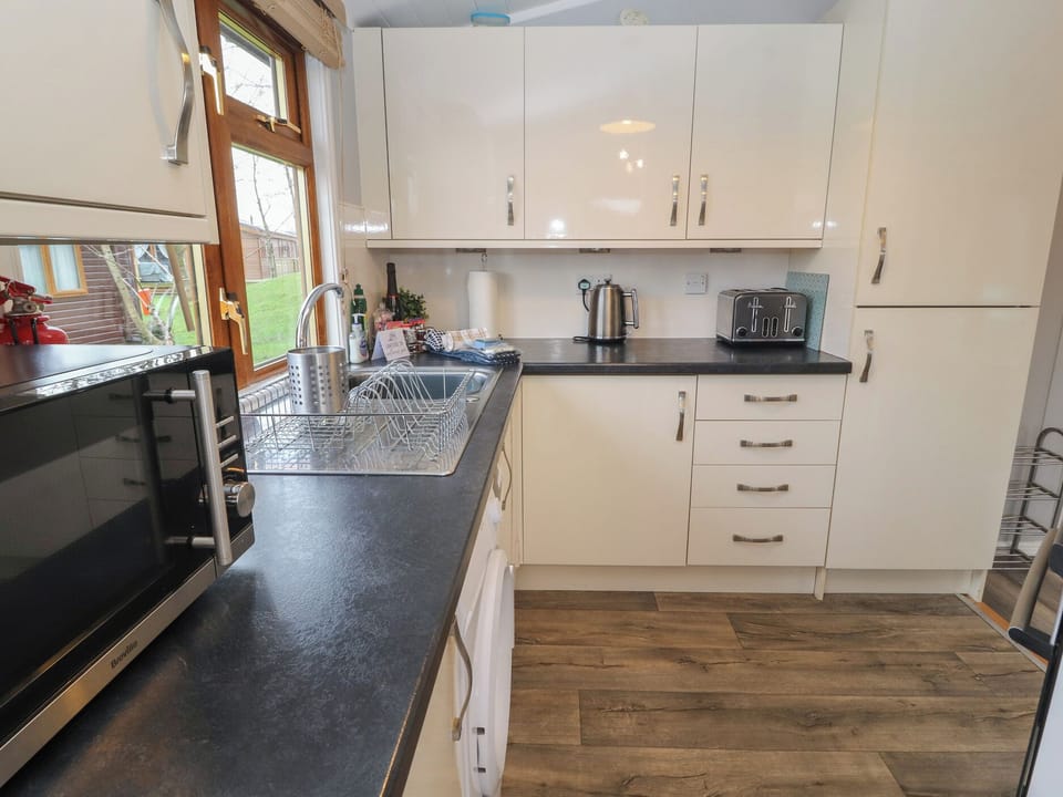 Fridge, electric kettle, toaster, cookware/dishes/utensils