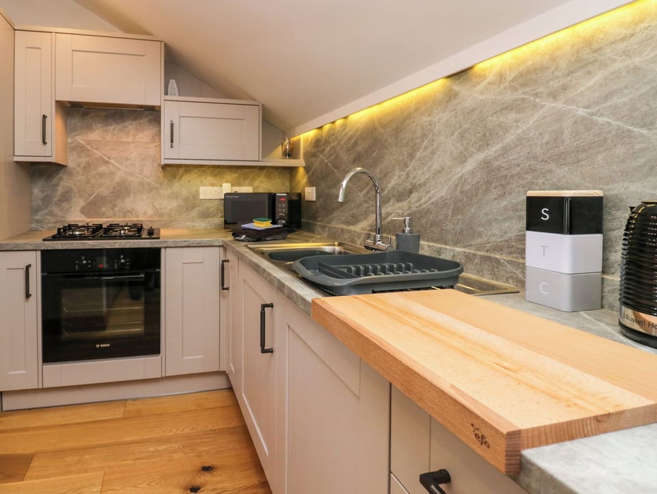 Fridge, electric kettle, toaster, cookware/dishes/utensils