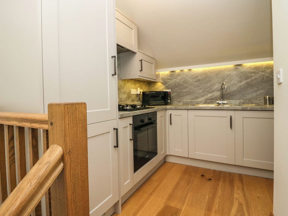 Fridge, electric kettle, toaster, cookware/dishes/utensils