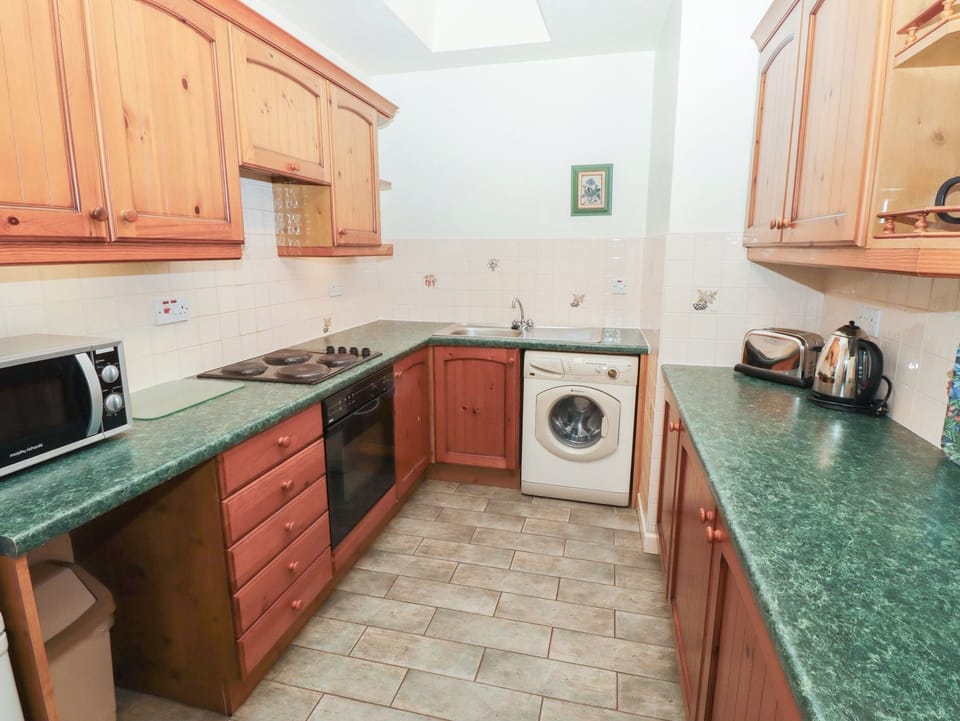 Fridge, microwave, toaster, cookware/dishes/utensils