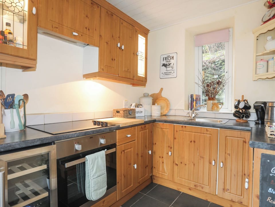 Fridge, electric kettle, cookware/dishes/utensils