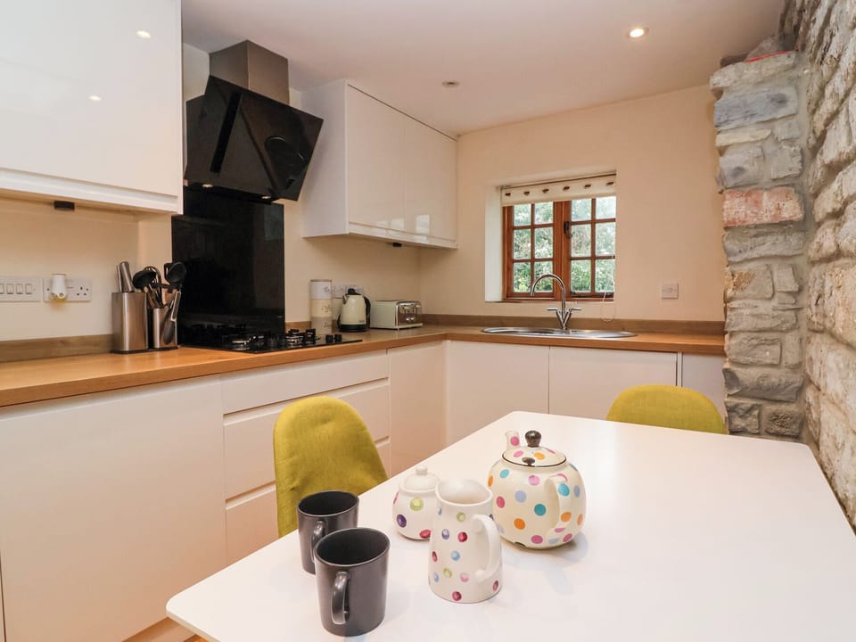 Fridge, electric kettle, toaster, cookware/dishes/utensils