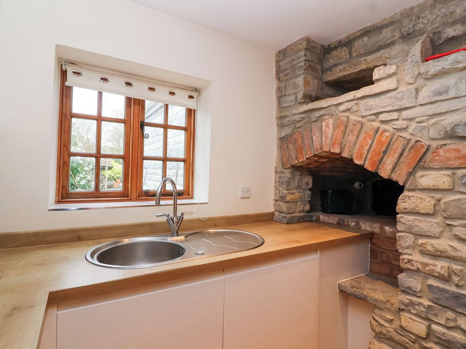 Fridge, electric kettle, toaster, cookware/dishes/utensils