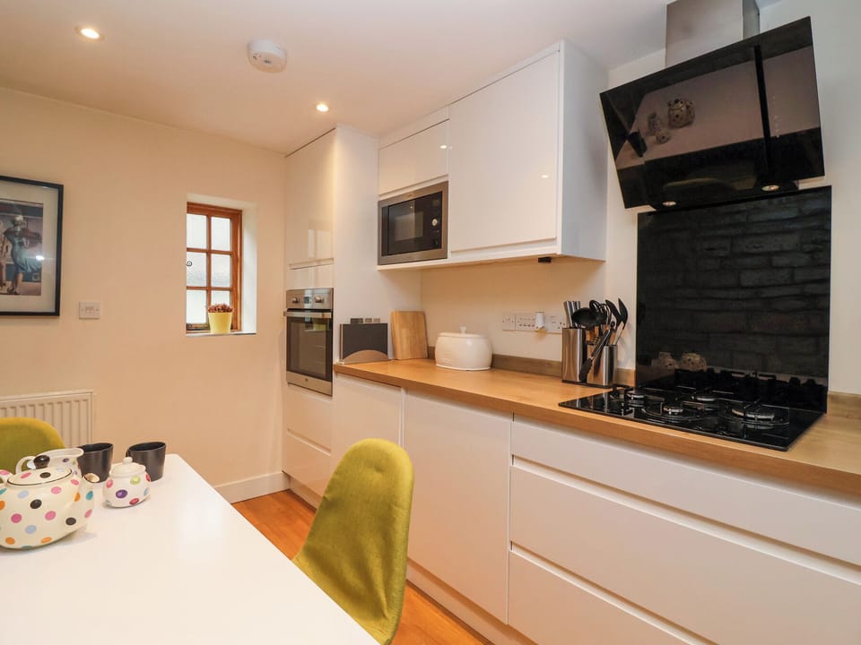 Fridge, electric kettle, toaster, cookware/dishes/utensils