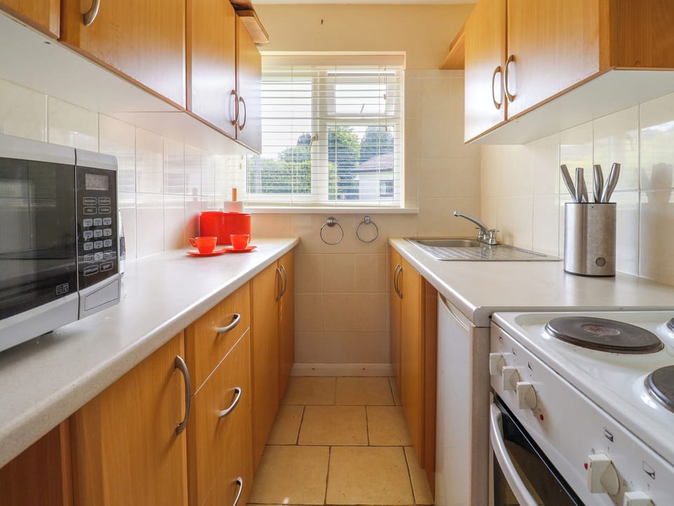 Fridge, electric kettle, toaster, cookware/dishes/utensils