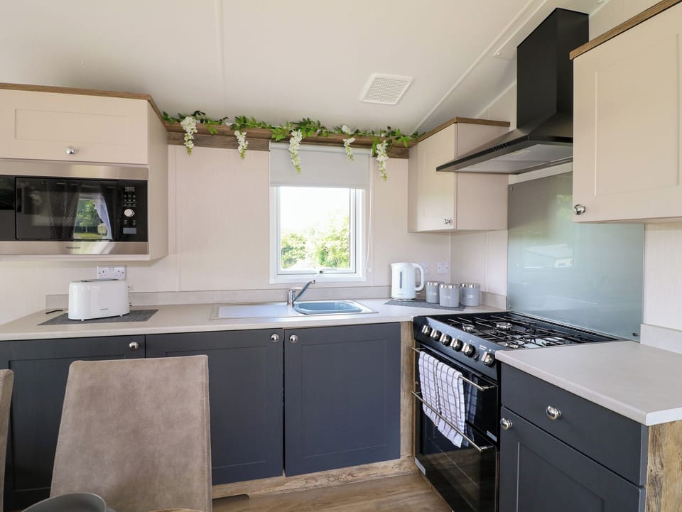Fridge, electric kettle, toaster, cookware/dishes/utensils