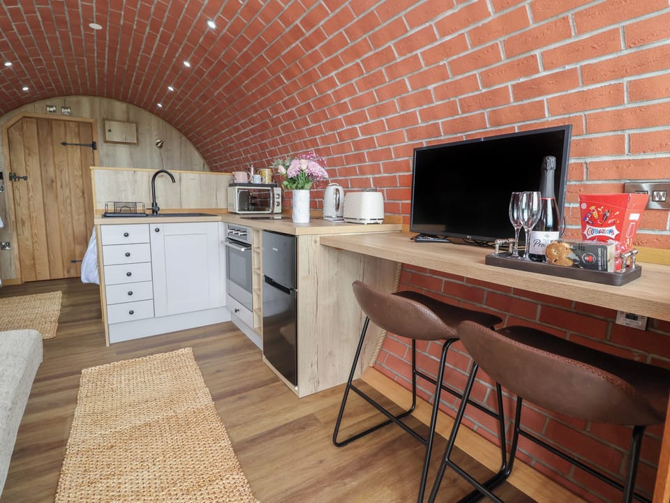 Fridge, electric kettle, toaster, cookware/dishes/utensils