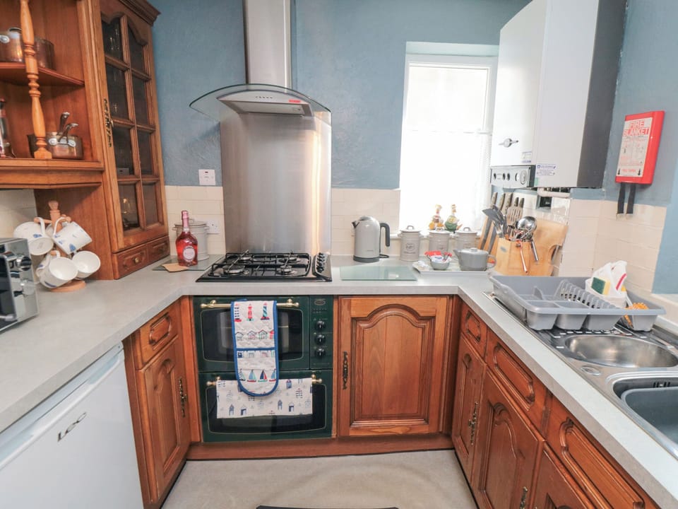 Fridge, electric kettle, toaster, cookware/dishes/utensils