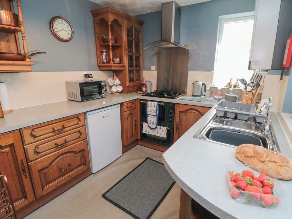 Fridge, electric kettle, toaster, cookware/dishes/utensils