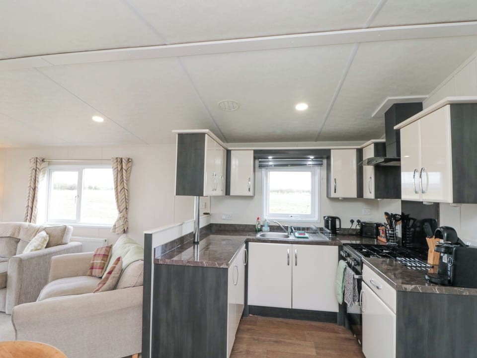 Fridge, electric kettle, cookware/dishes/utensils