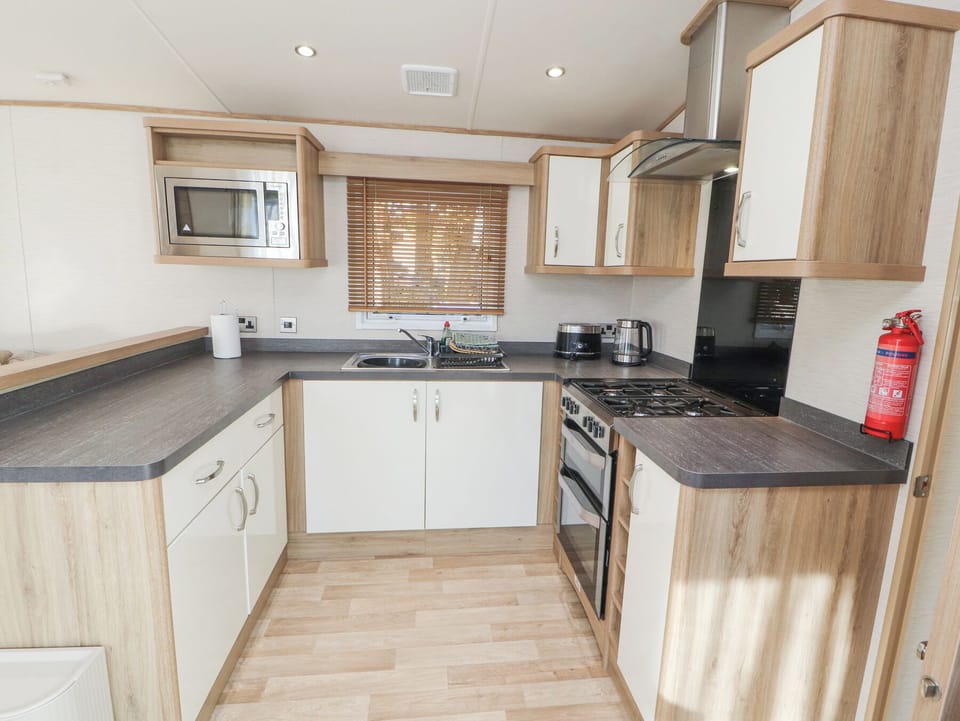 Fridge, microwave, toaster, cookware/dishes/utensils
