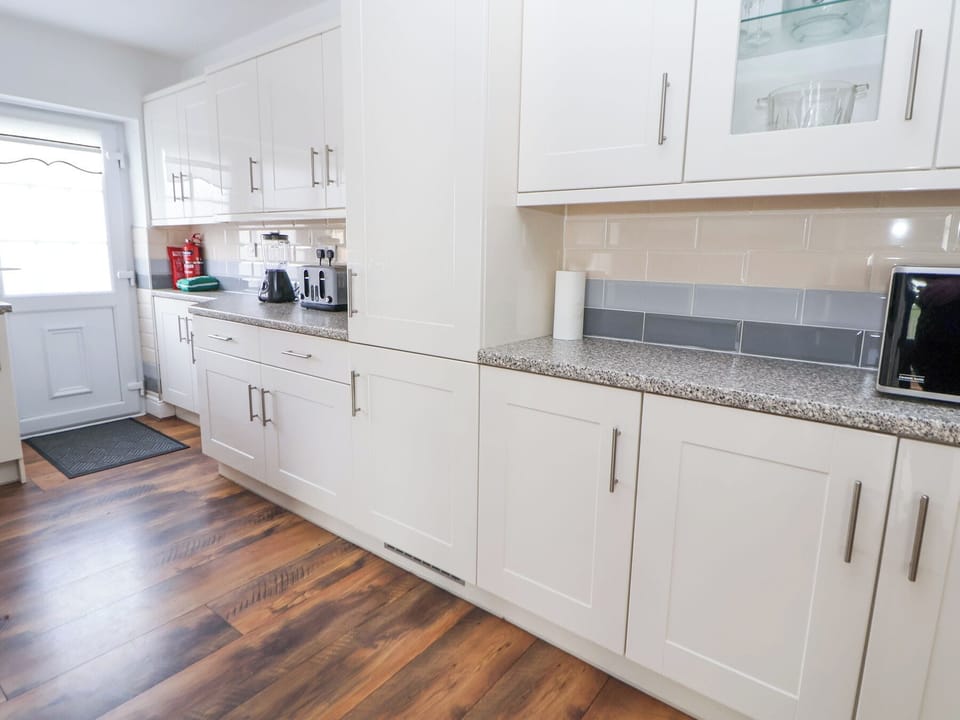 Fridge, electric kettle, toaster, cookware/dishes/utensils