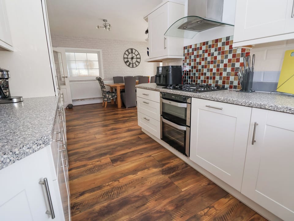 Fridge, electric kettle, toaster, cookware/dishes/utensils