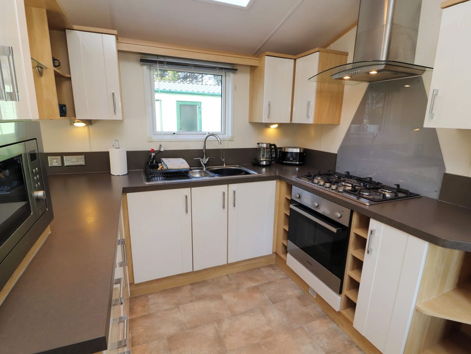 Fridge, microwave, toaster, cookware/dishes/utensils