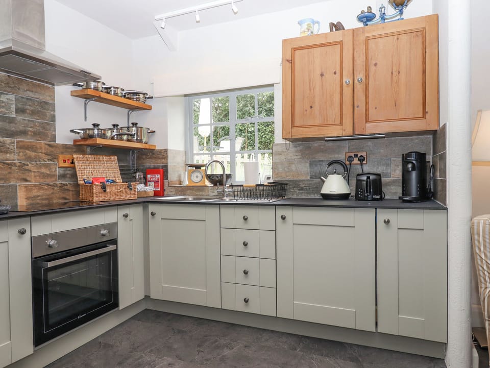 Fridge, electric kettle, toaster, cookware/dishes/utensils