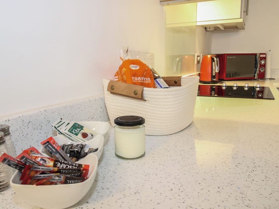 Fridge, dishwasher, electric kettle, cookware/dishes/utensils