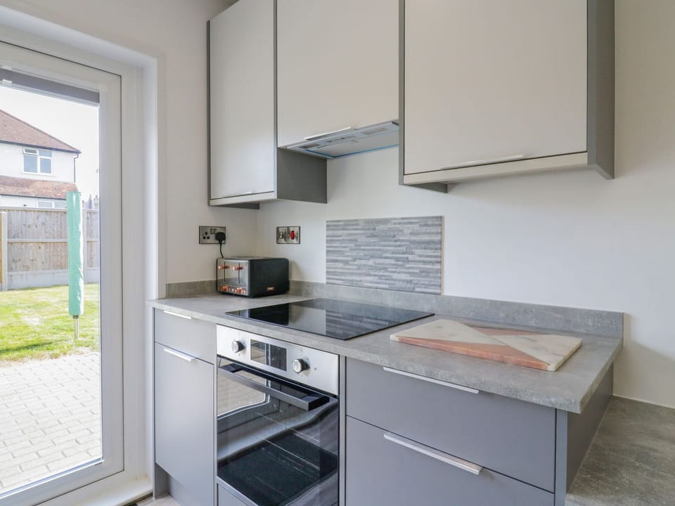 Fridge, electric kettle, toaster, cookware/dishes/utensils