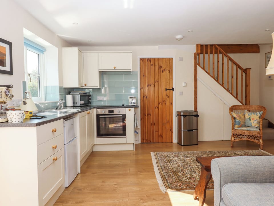 Fridge, electric kettle, toaster, cookware/dishes/utensils