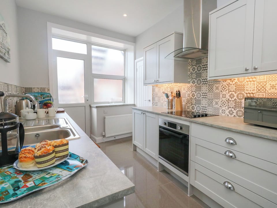 Fridge, dishwasher, electric kettle, toaster