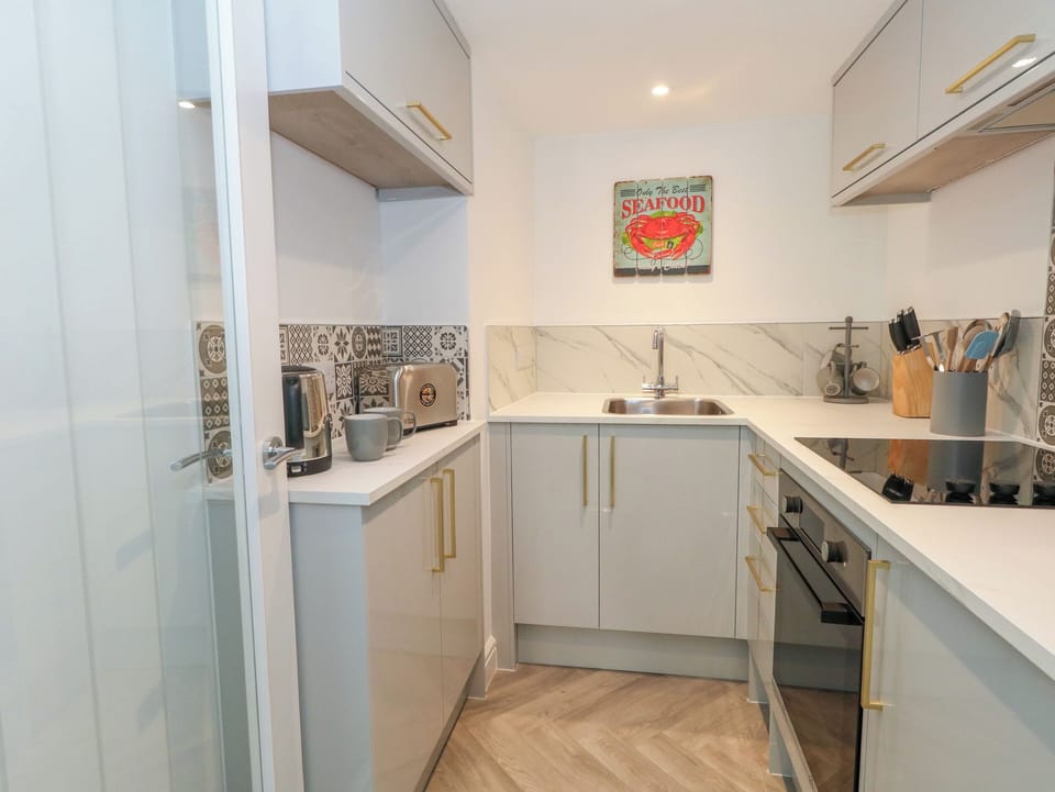 Fridge, electric kettle, toaster, cookware/dishes/utensils