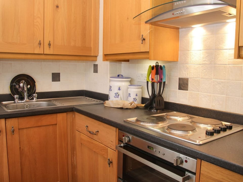 Fridge, electric kettle, toaster, cookware/dishes/utensils