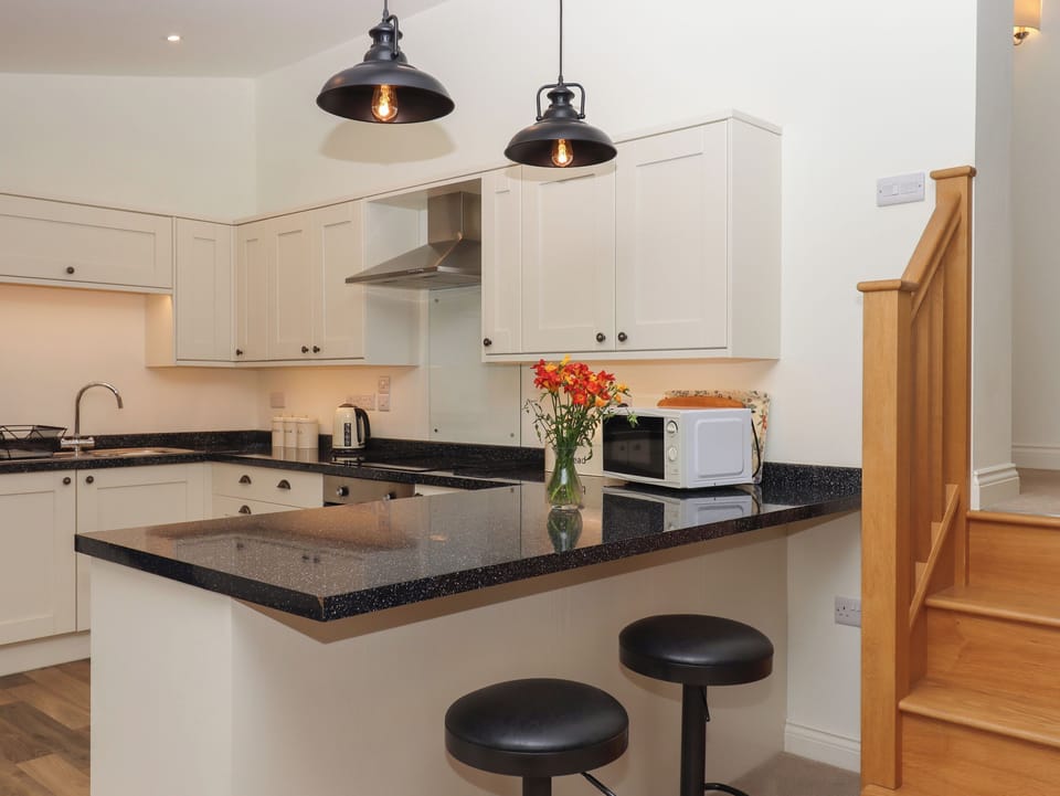 Fridge, electric kettle, toaster, cookware/dishes/utensils