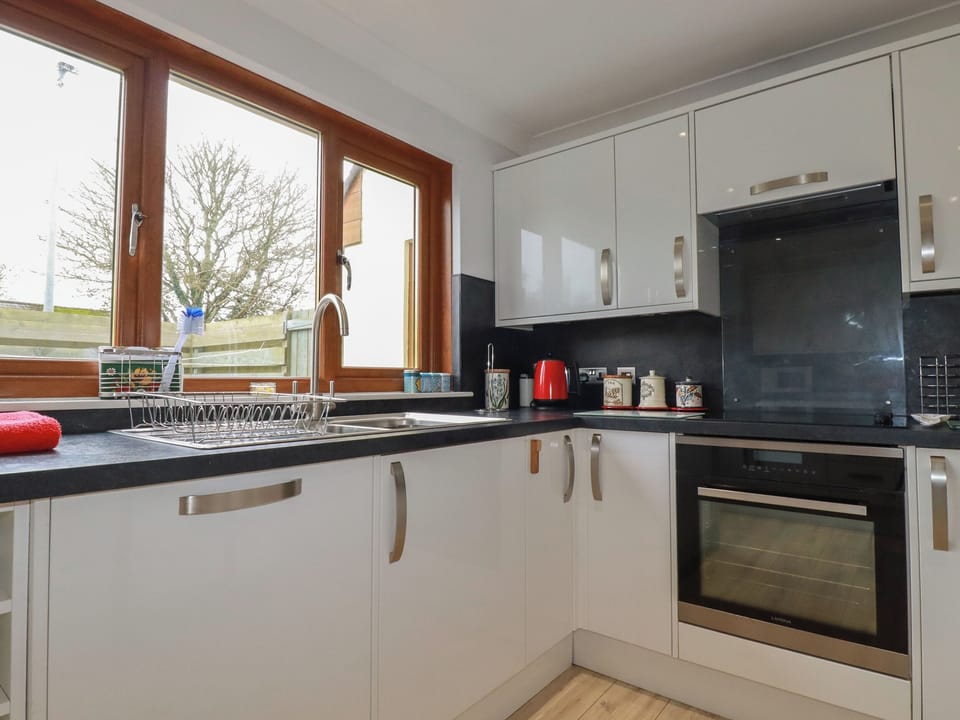 Fridge, dishwasher, electric kettle, cookware/dishes/utensils