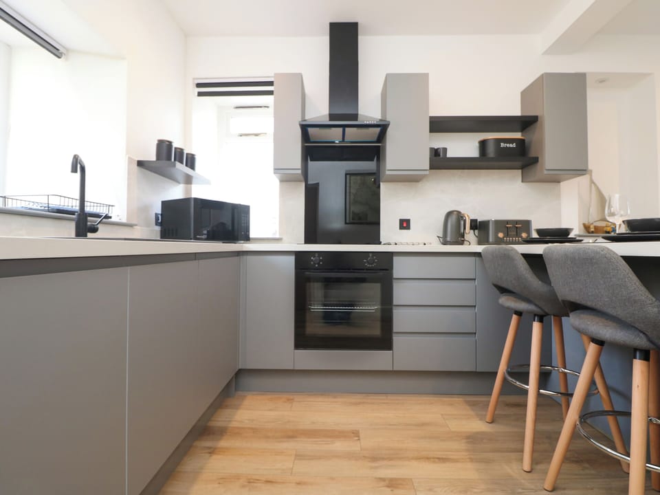 Fridge, electric kettle, toaster, cookware/dishes/utensils
