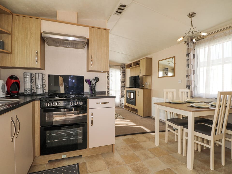 Fridge, electric kettle, toaster, cookware/dishes/utensils