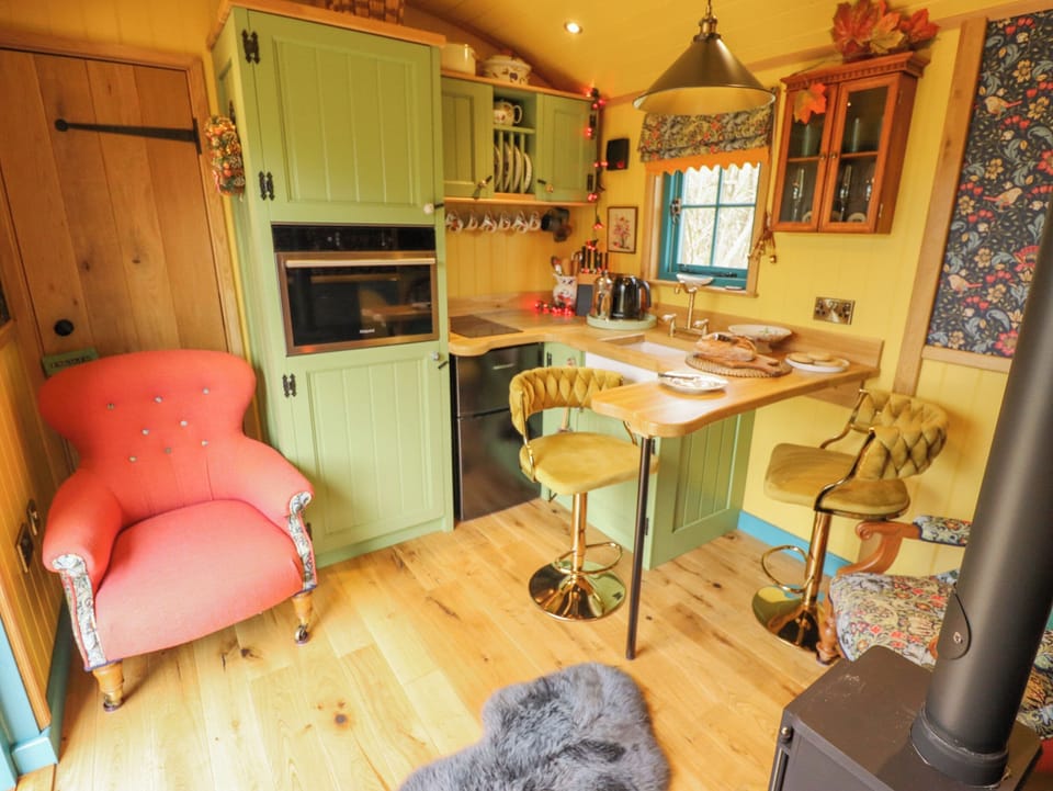 Fridge, electric kettle, toaster, cookware/dishes/utensils