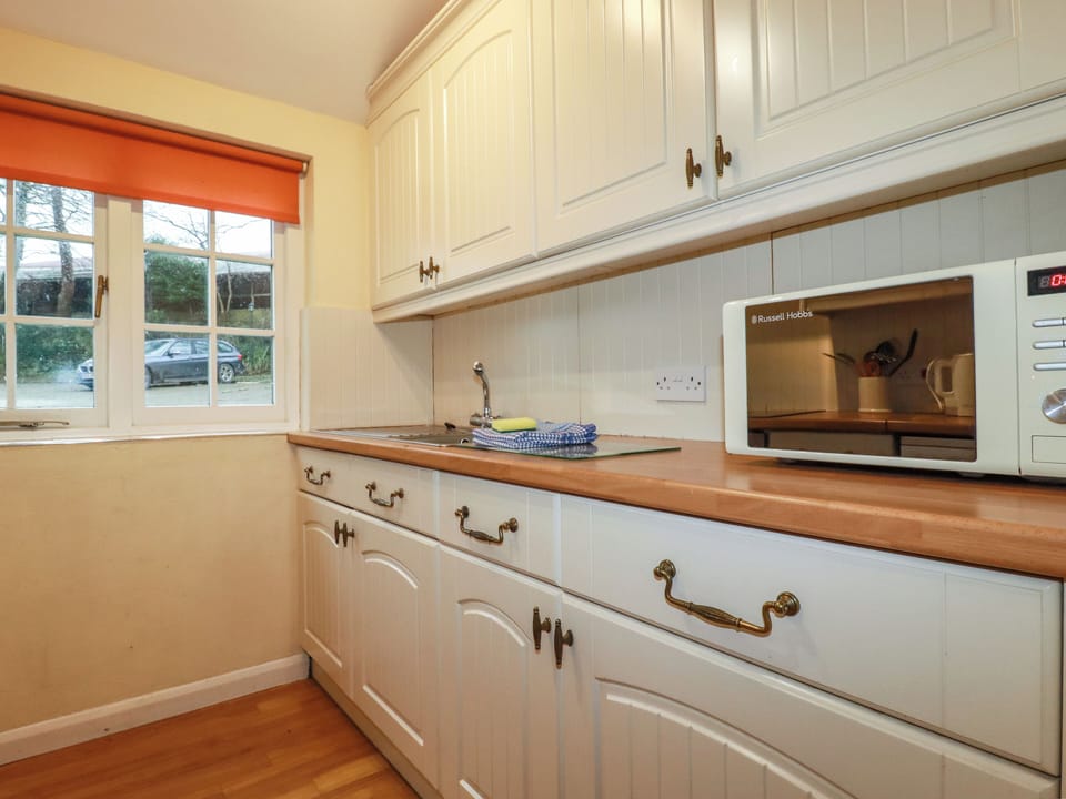Fridge, electric kettle, toaster, cookware/dishes/utensils