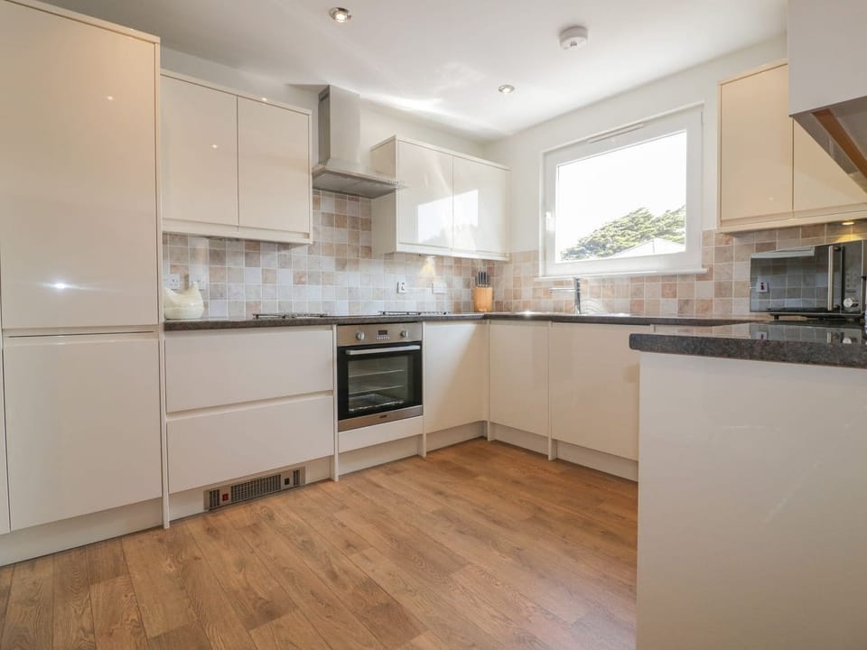 Fridge, dishwasher, electric kettle, cookware/dishes/utensils