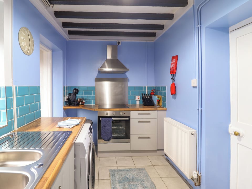 Fridge, electric kettle, toaster, cookware/dishes/utensils
