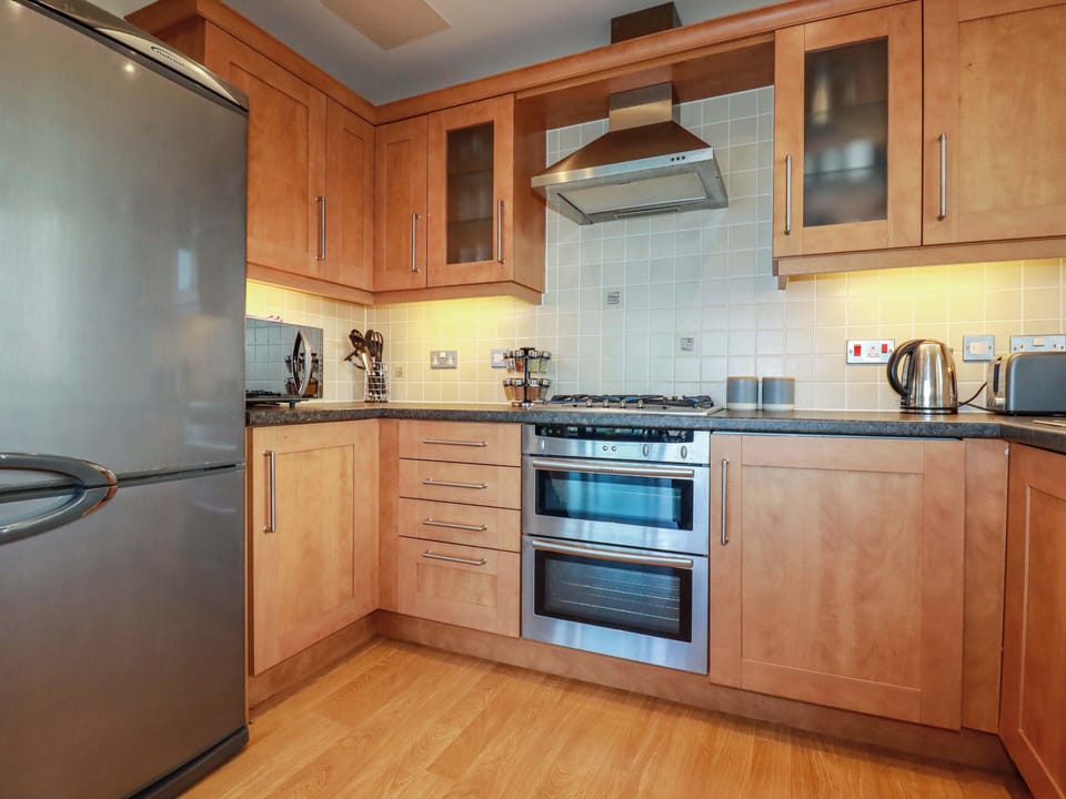 Fridge, dishwasher, electric kettle, cookware/dishes/utensils