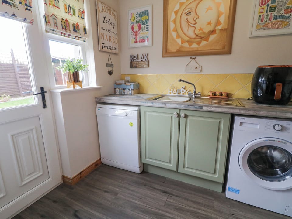 Fridge, dishwasher, electric kettle, cookware/dishes/utensils