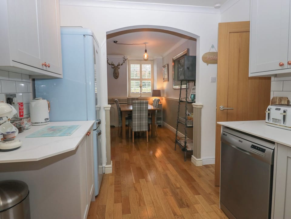 Fridge, dishwasher, electric kettle, cookware/dishes/utensils