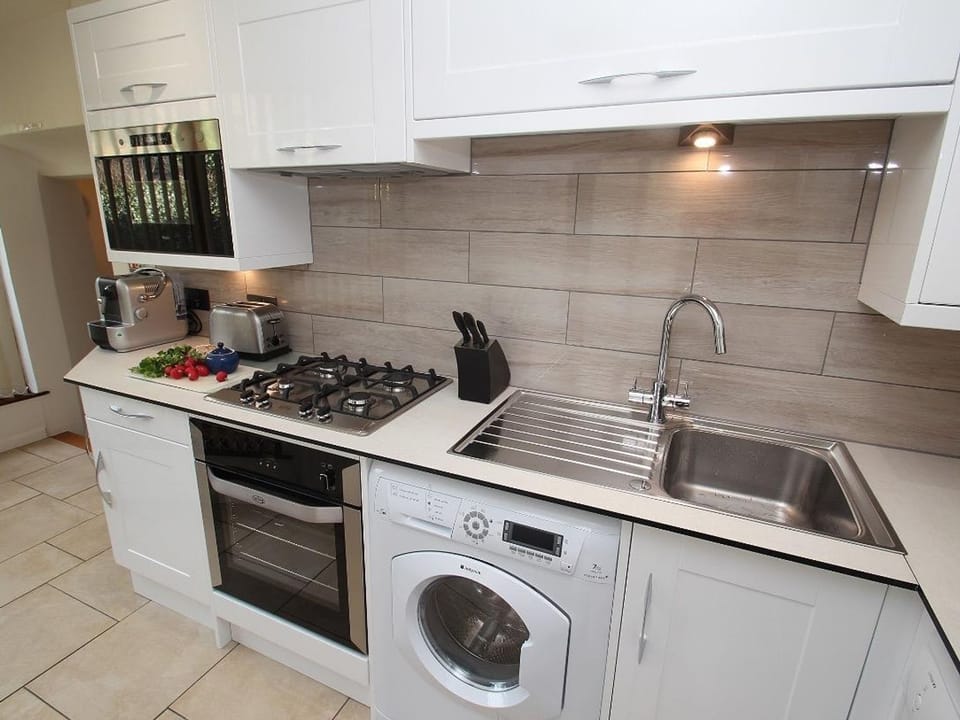 Fridge, dishwasher, electric kettle, cookware/dishes/utensils