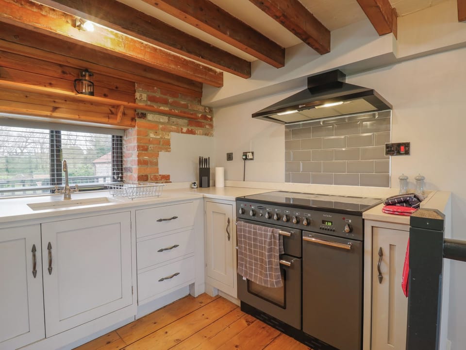 Fridge, dishwasher, electric kettle, cookware/dishes/utensils