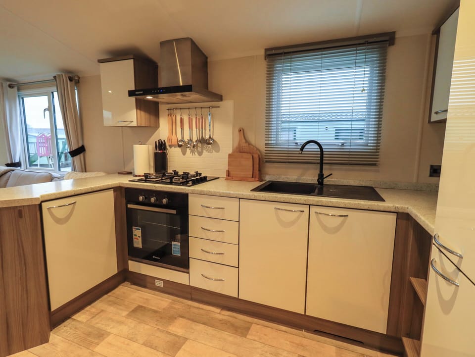 Fridge, electric kettle, toaster, cookware/dishes/utensils