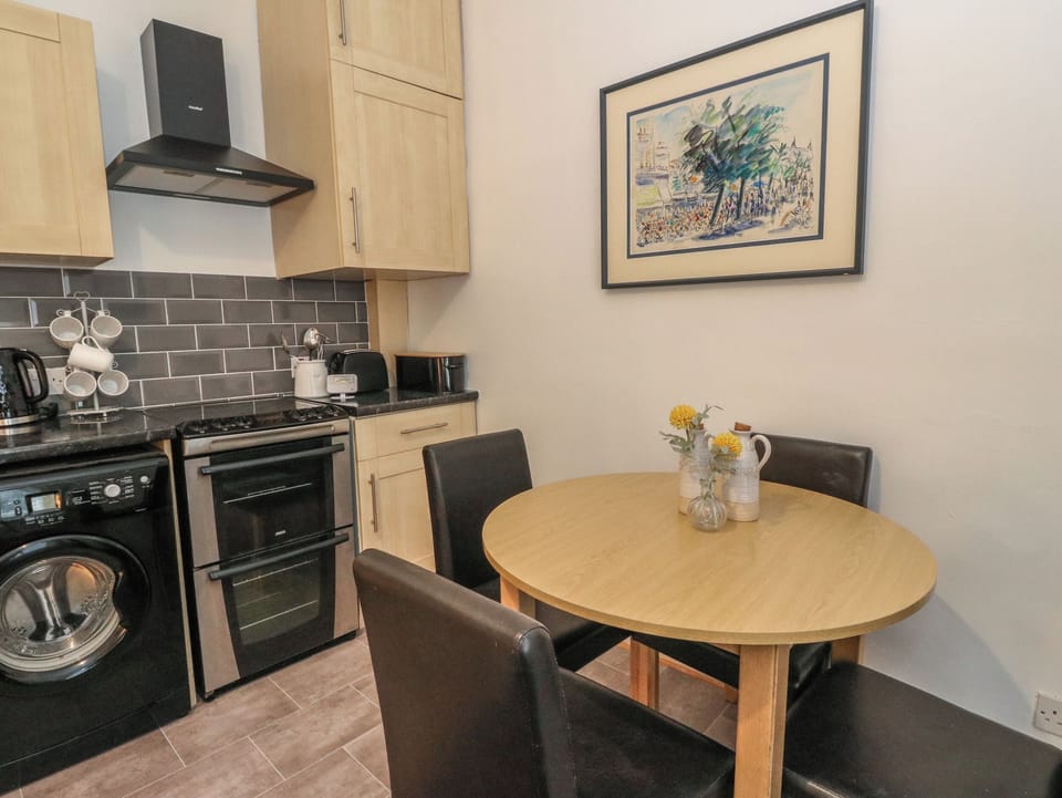 Fridge, electric kettle, toaster, cookware/dishes/utensils