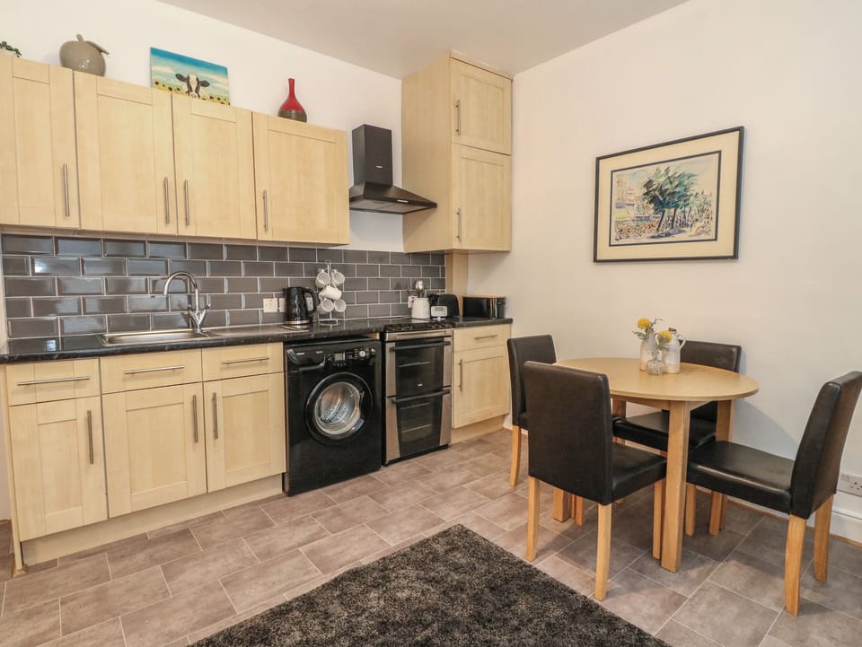 Fridge, electric kettle, toaster, cookware/dishes/utensils