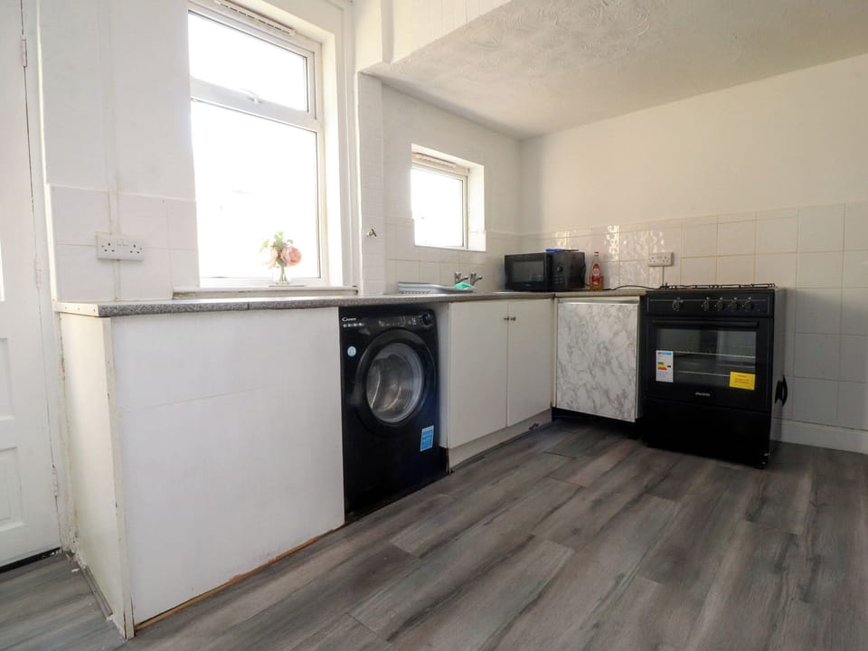 Fridge, electric kettle, toaster, cookware/dishes/utensils