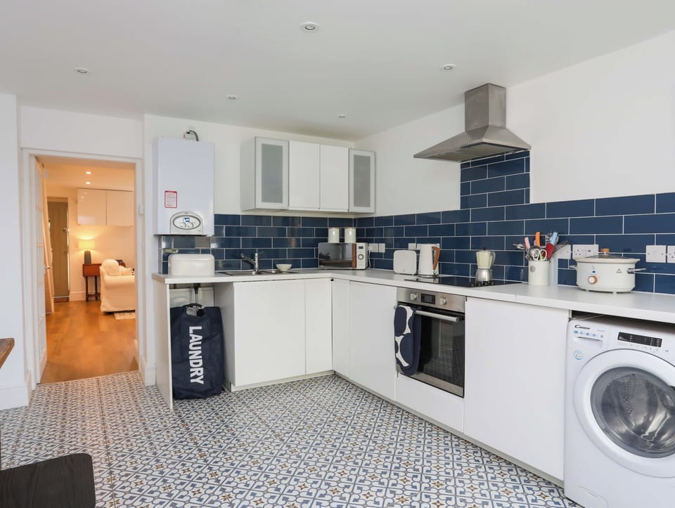 Fridge, electric kettle, toaster, cookware/dishes/utensils