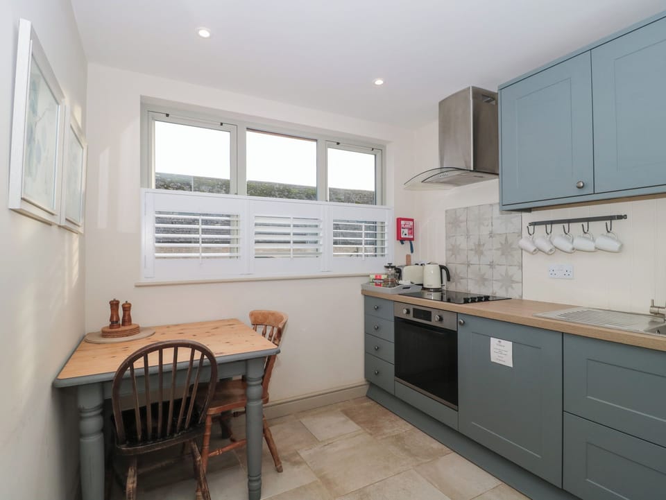 Fridge, electric kettle, toaster, cookware/dishes/utensils