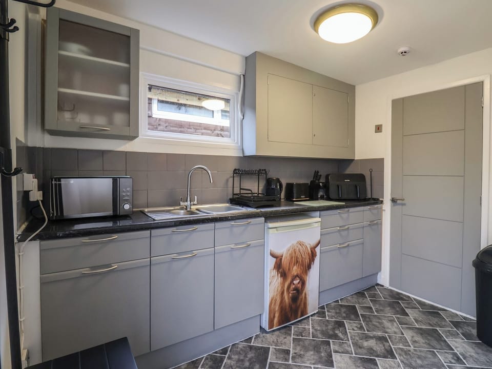 Fridge, electric kettle, toaster, cookware/dishes/utensils
